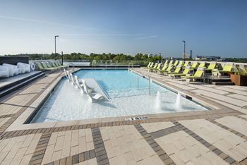 Rooftop lounge, fitness center & pool